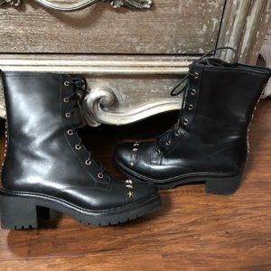 Michael Kors black leather moto boots.